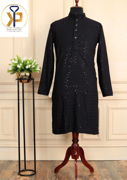 Men's black chikankari kurta pyjama with detailed embroidery, ideal for sophisticated and traditional events