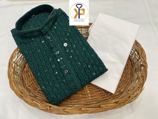 Men's dark green chikankari kurta pyjama featuring intricate embroidery, perfect for festive and ceremonial occasions