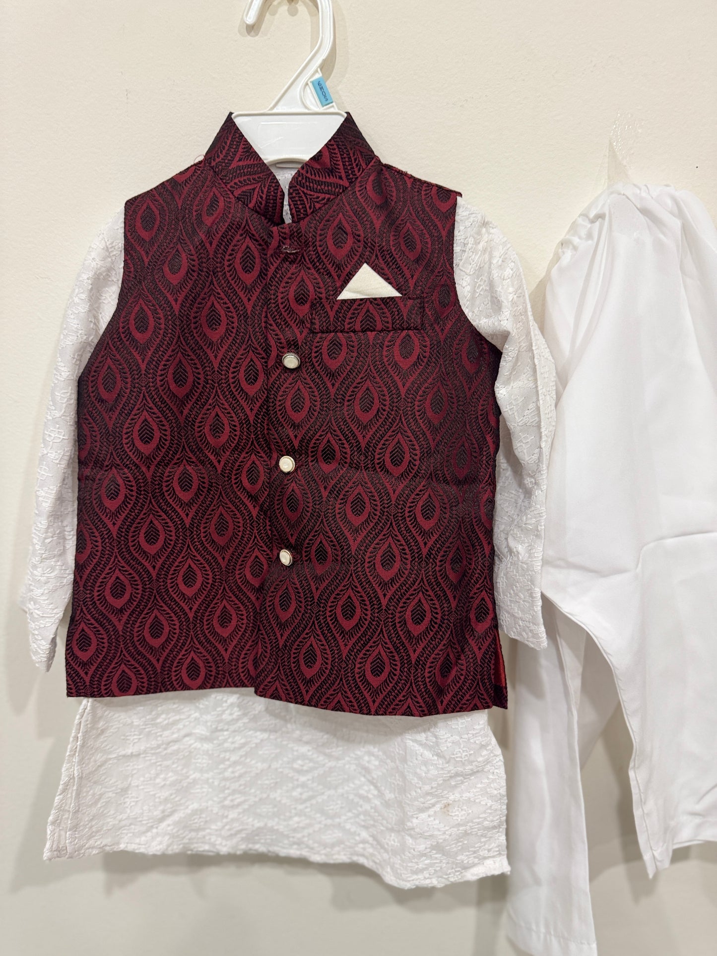 white kurta and maroon nehru jacket