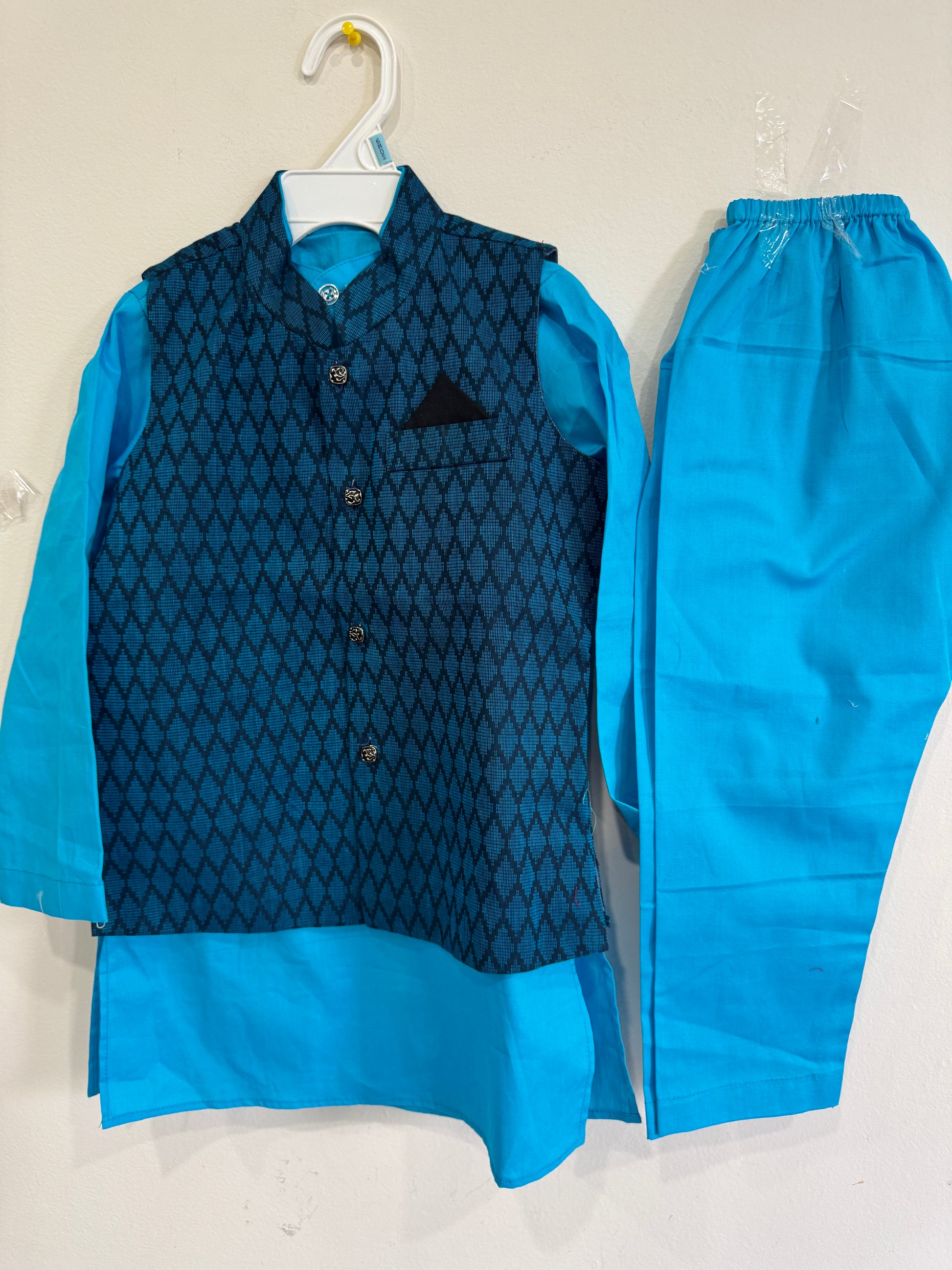 blue kurta and teal nehru jacket