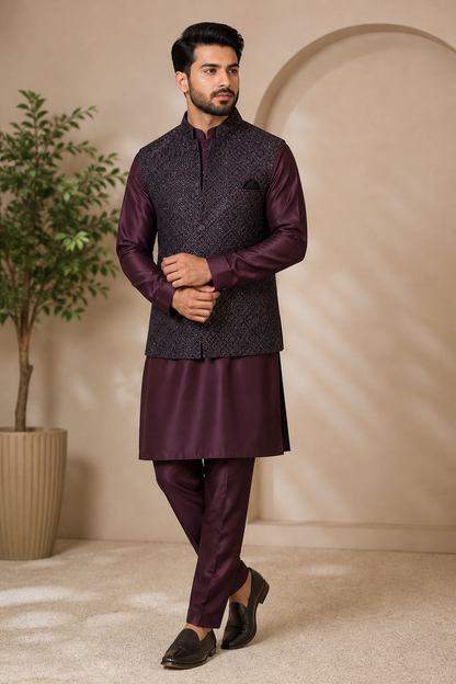Man wearing a wine kurta pyjama with velvet wine nehru jacket 