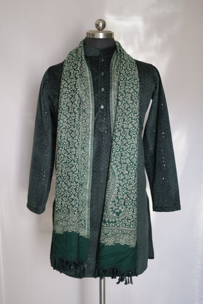 Green patterned bag with a metallic clasp on a white background