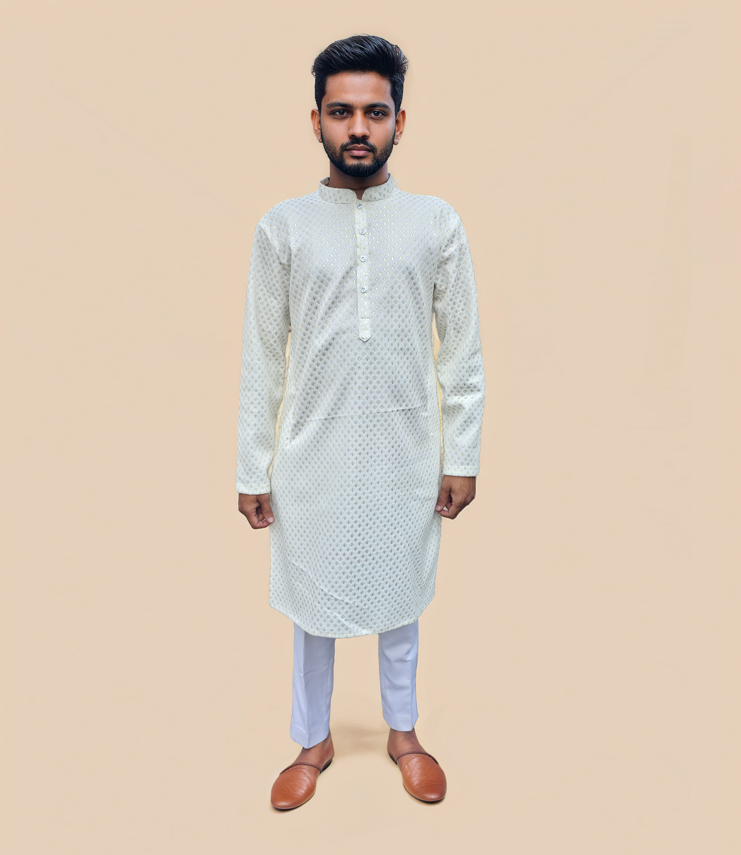 Man wearing white gold kurta pyjama 